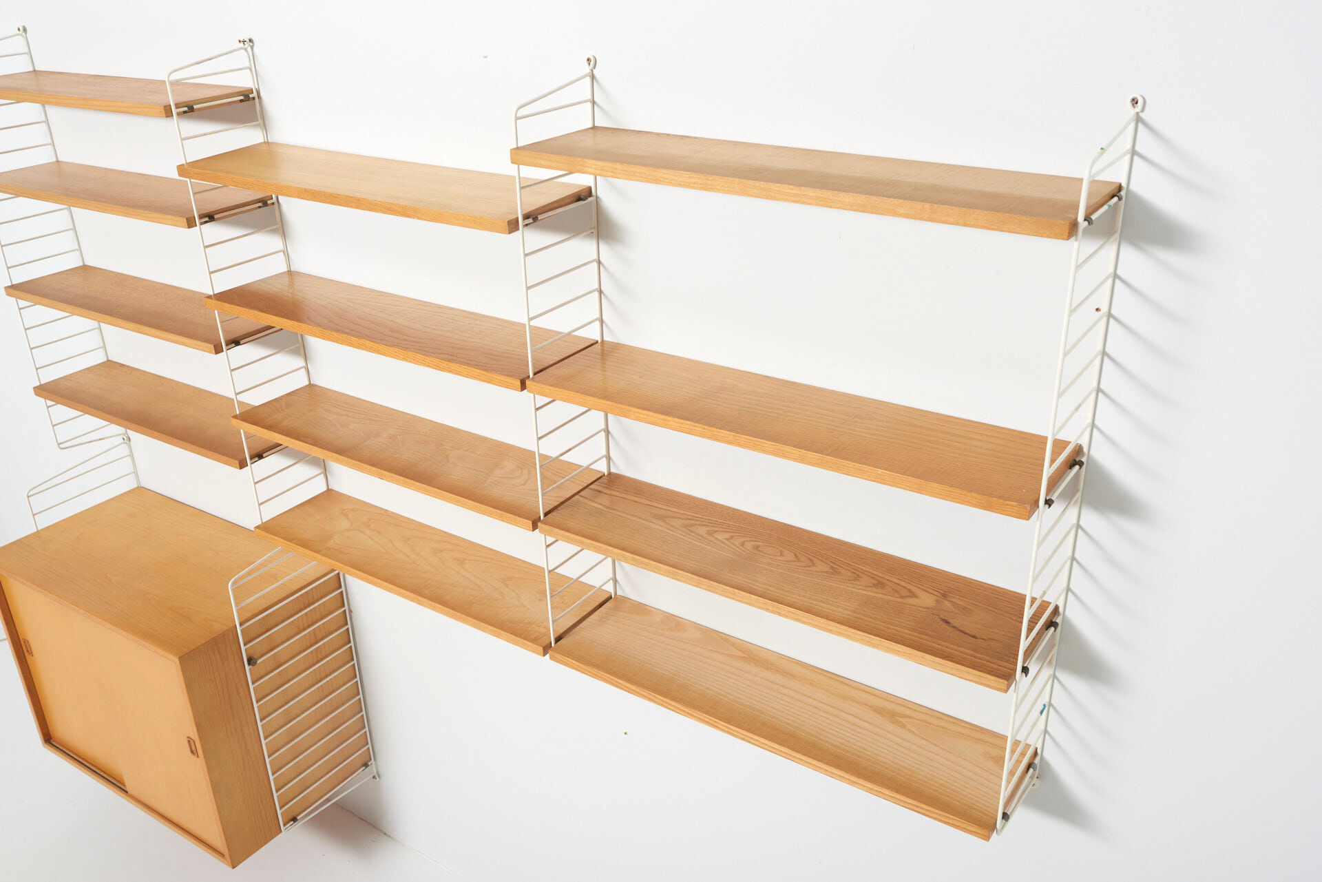 String wall system in ash by Nisse Strinning, Sweden 1950