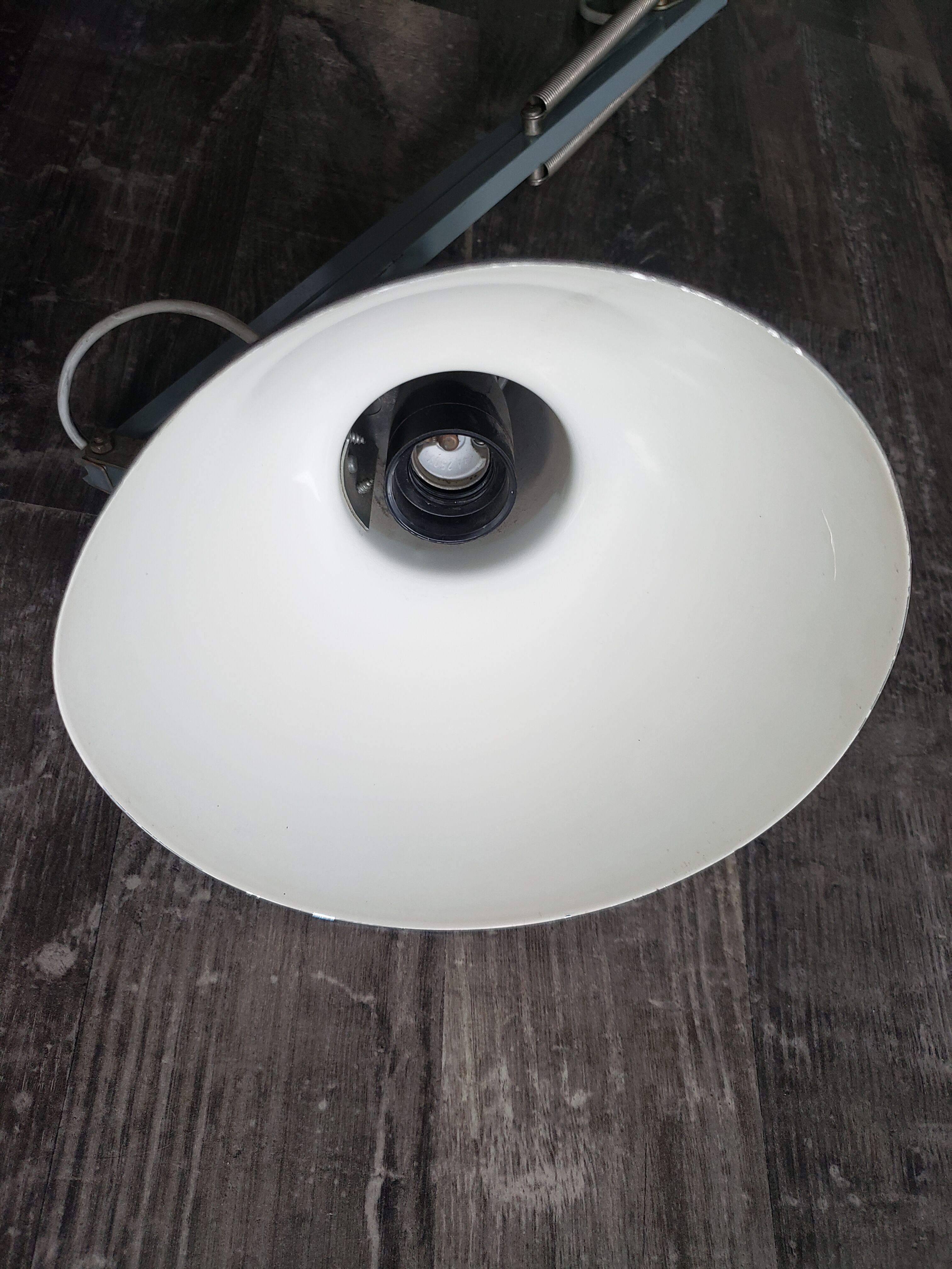 Grey articulated architect lamp to be restored