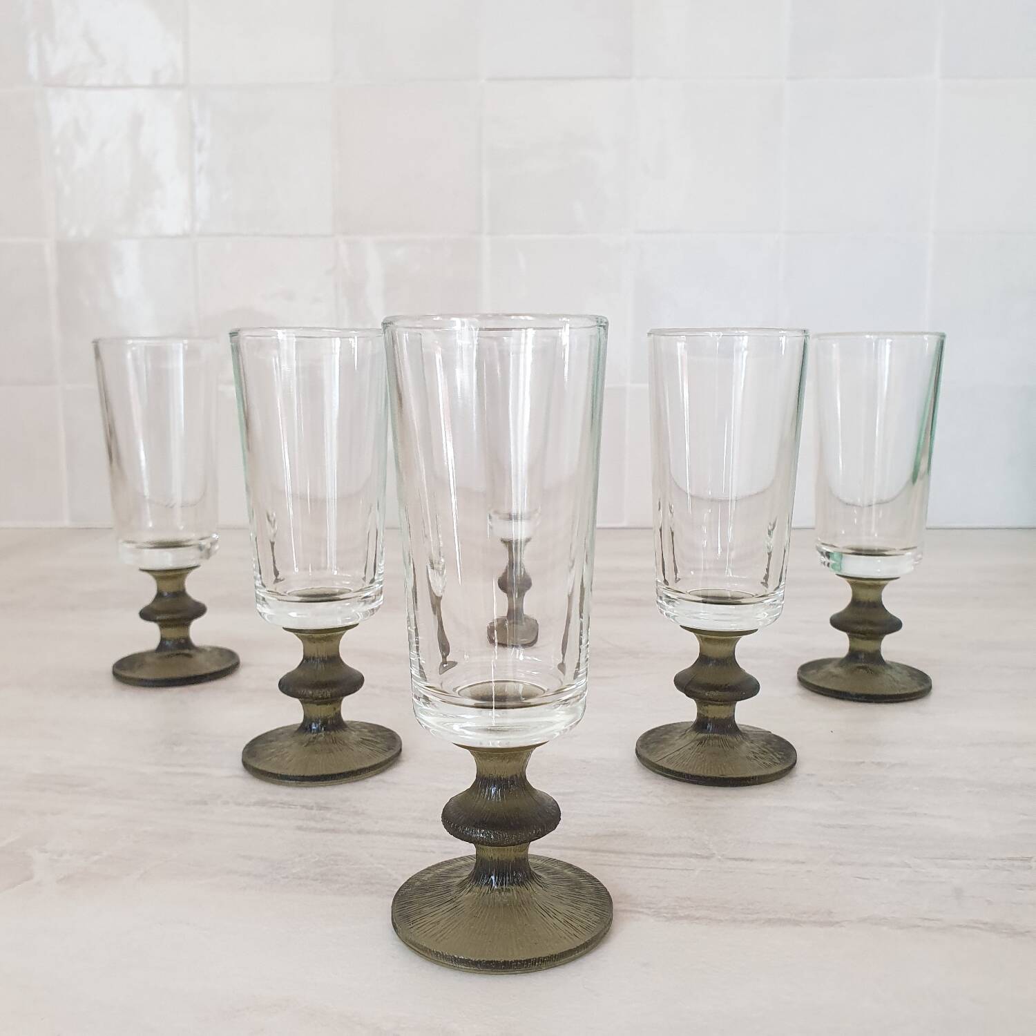 6 small green foot flutes in the Timo Sarpaneva style