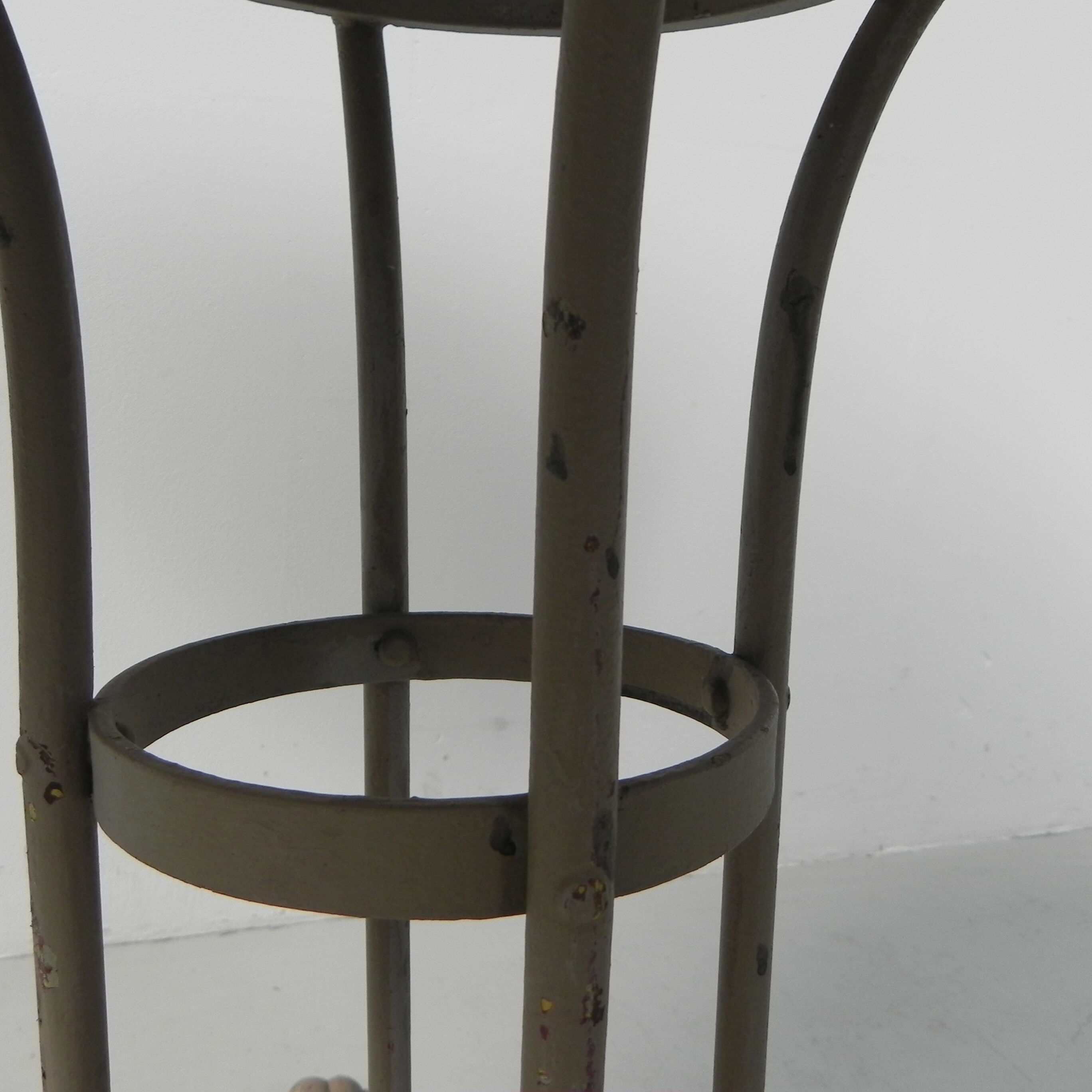 Steel garden table on cast iron base