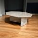 Octagonal coffee table in travertine