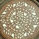 Ancient oriental pedestal table in carved wood