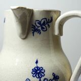 Fine earthenware pitcher with blue decoration, attributed to Saint-Uze, 19th century.