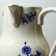 Fine earthenware pitcher with blue decoration, attributed to Saint-Uze, 19th century.