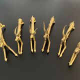 6 brass antelope-shaped knife holders