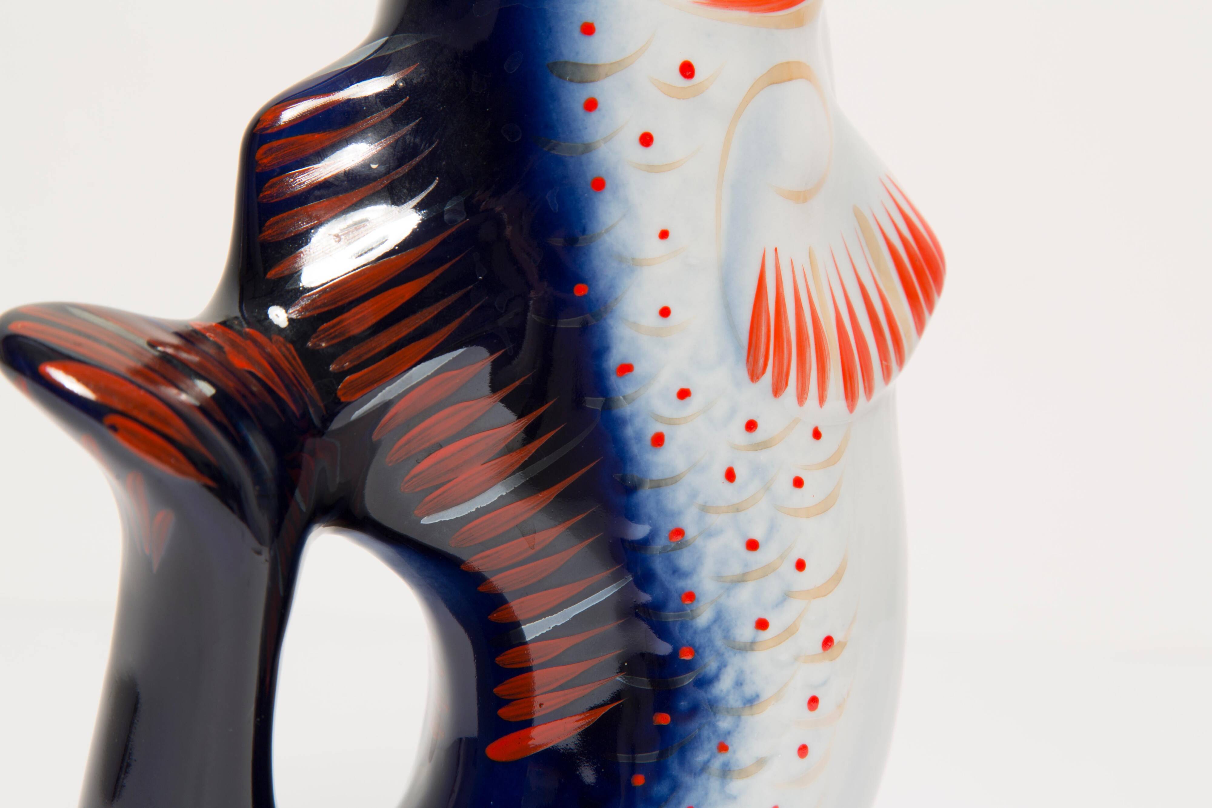 Set of 7 blue glass fish, mid-20th century.
