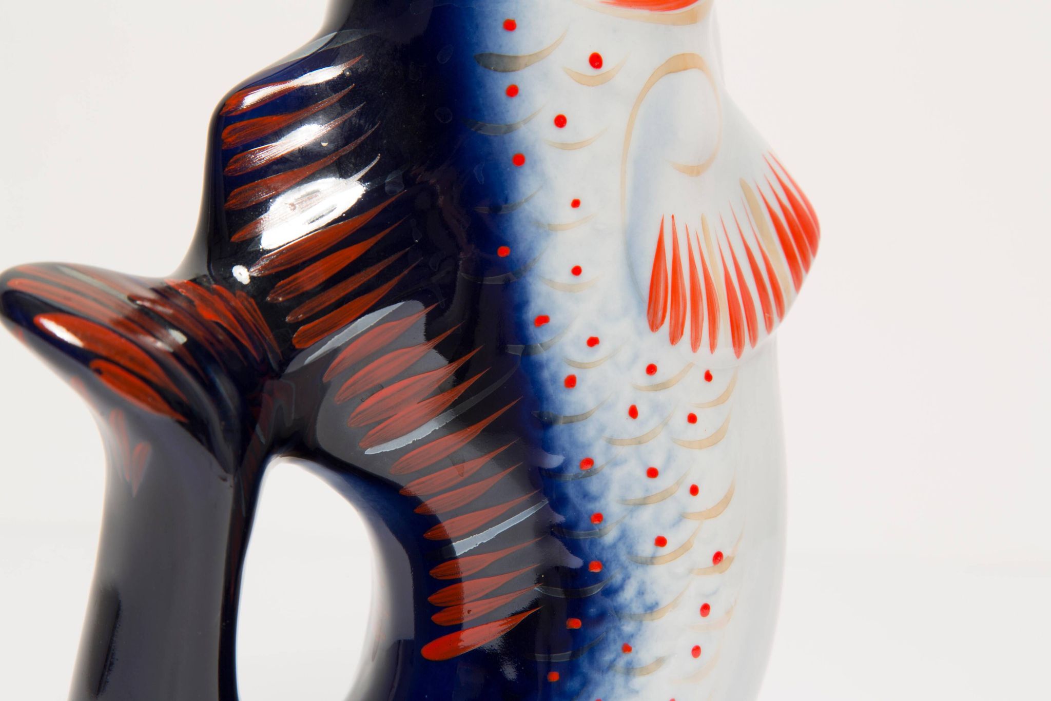Set of 7 blue glass fish, mid-20th century.