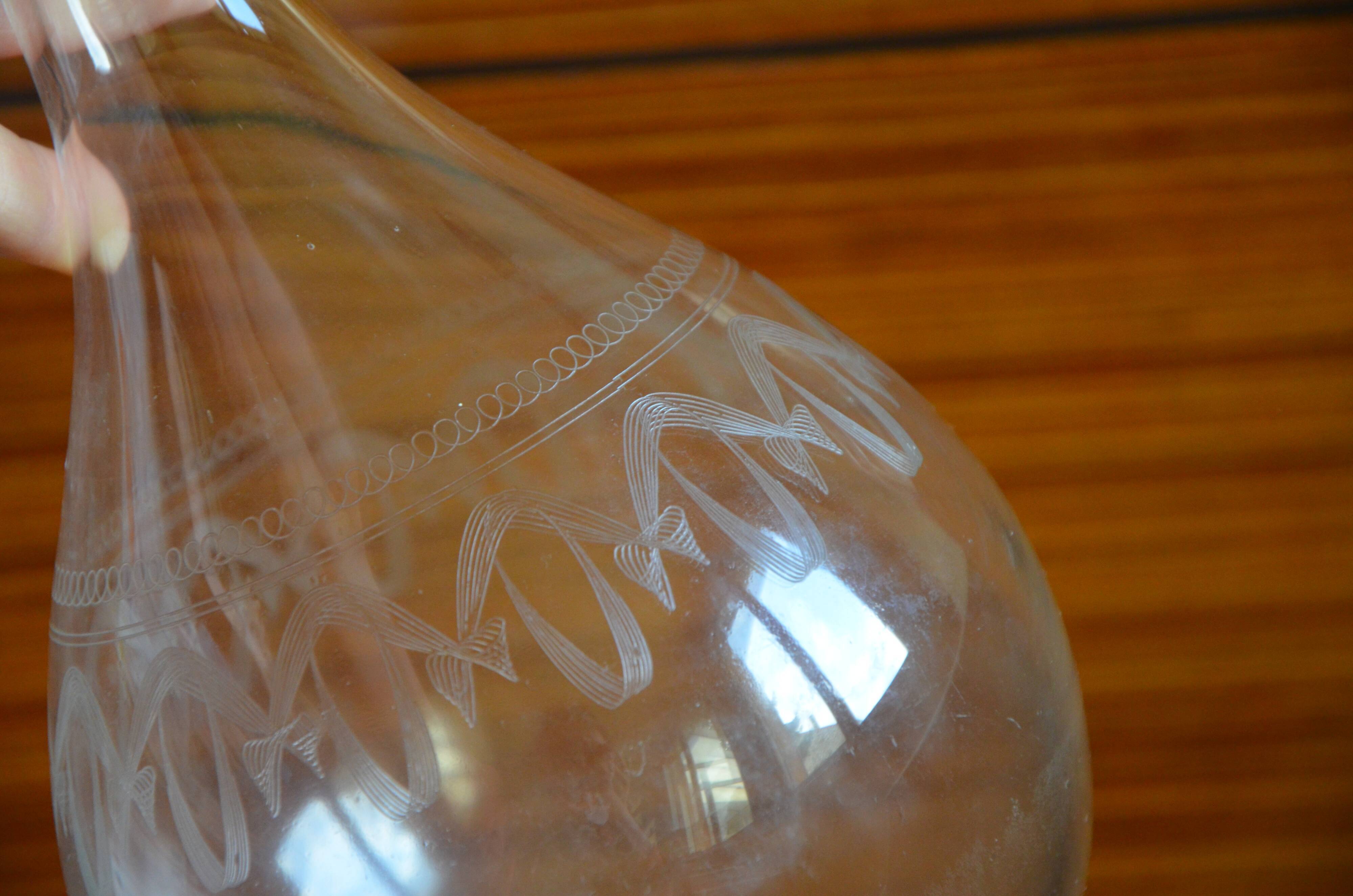 Curved carafe engraved glass