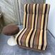 Vintage 1970s lounge chair – striped orange, brown, and cream velvet