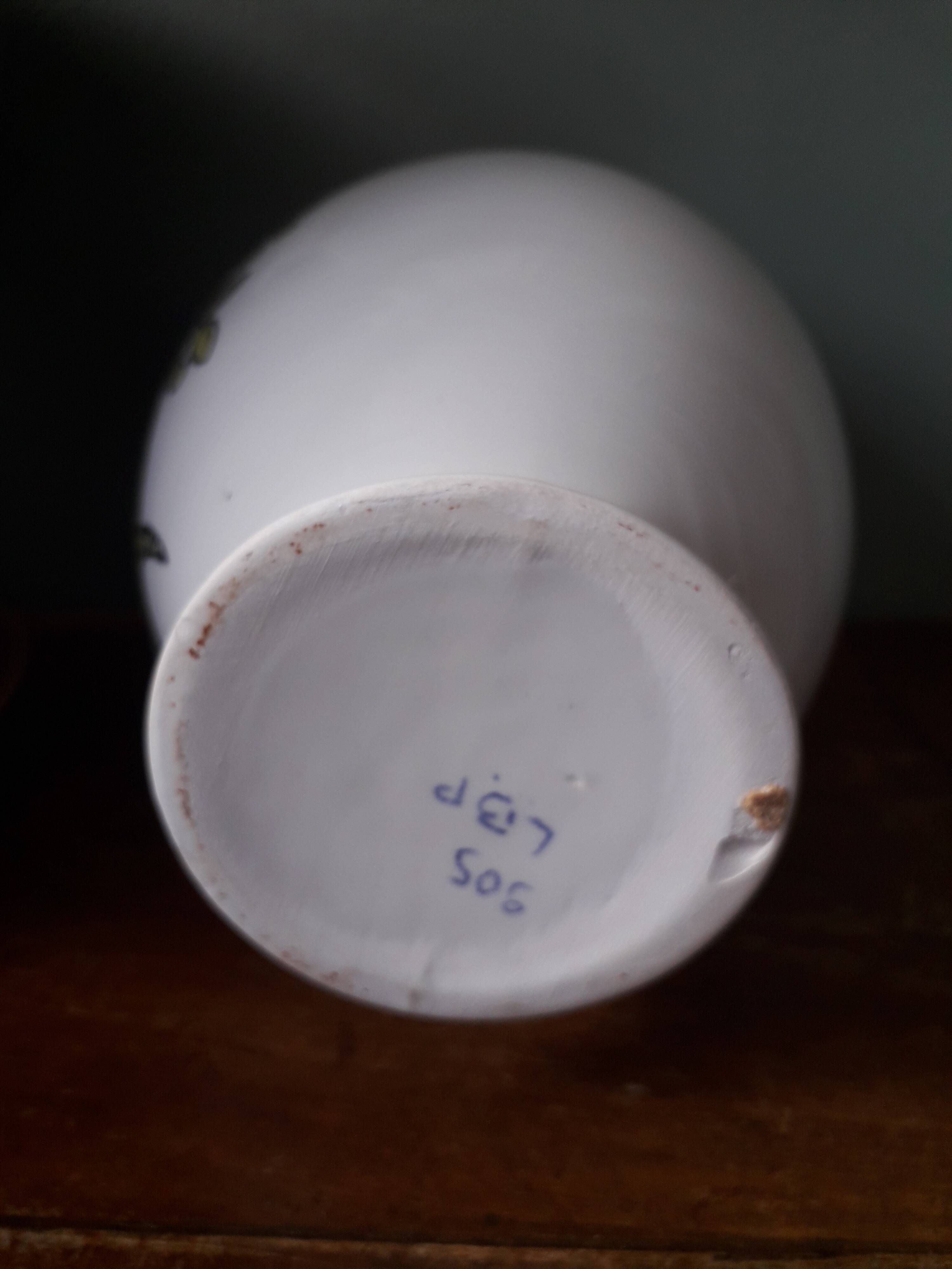 Vintage vase with herbalist pot decor