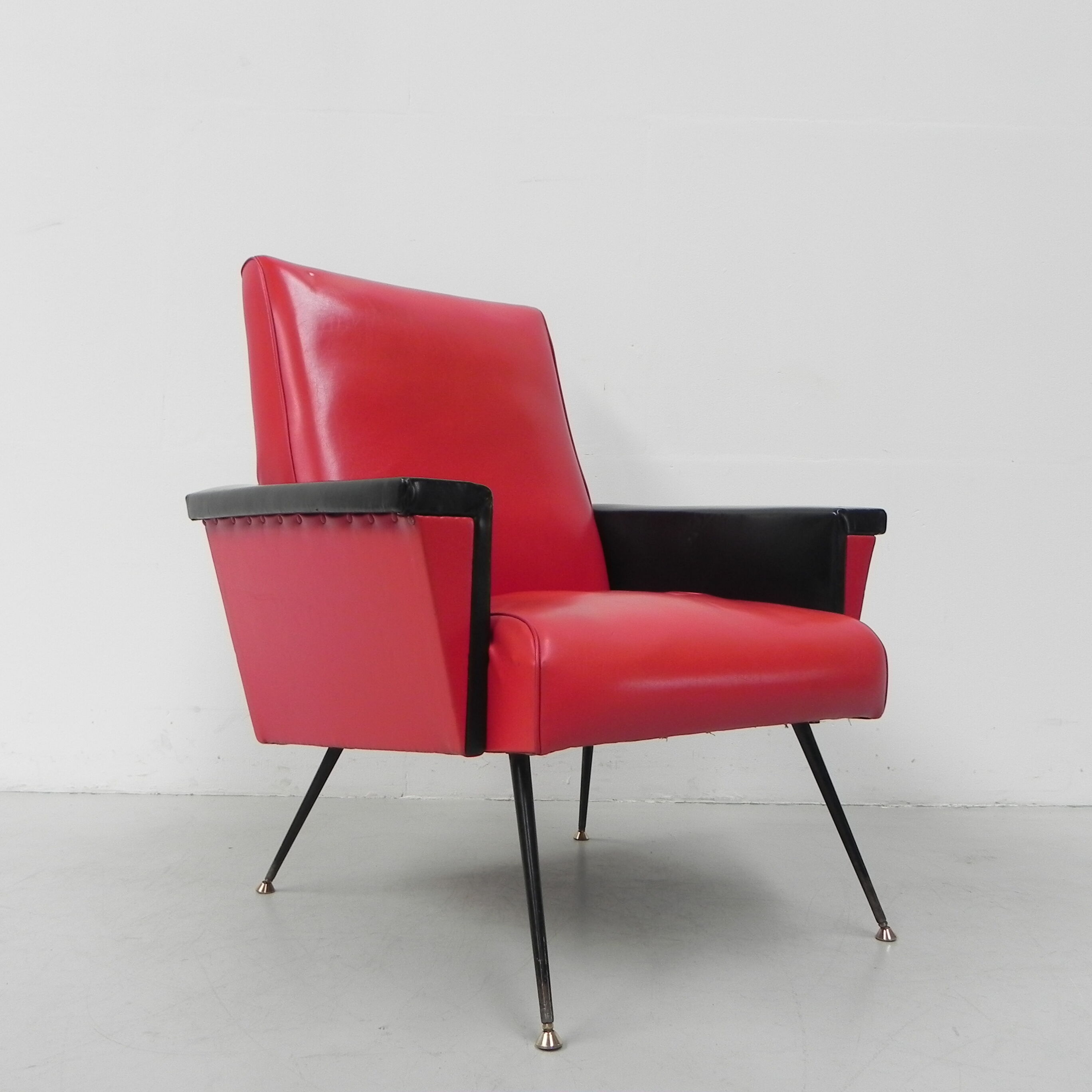 Vintage skai armchair with armrests