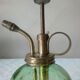 Spray for plants in brass and glass