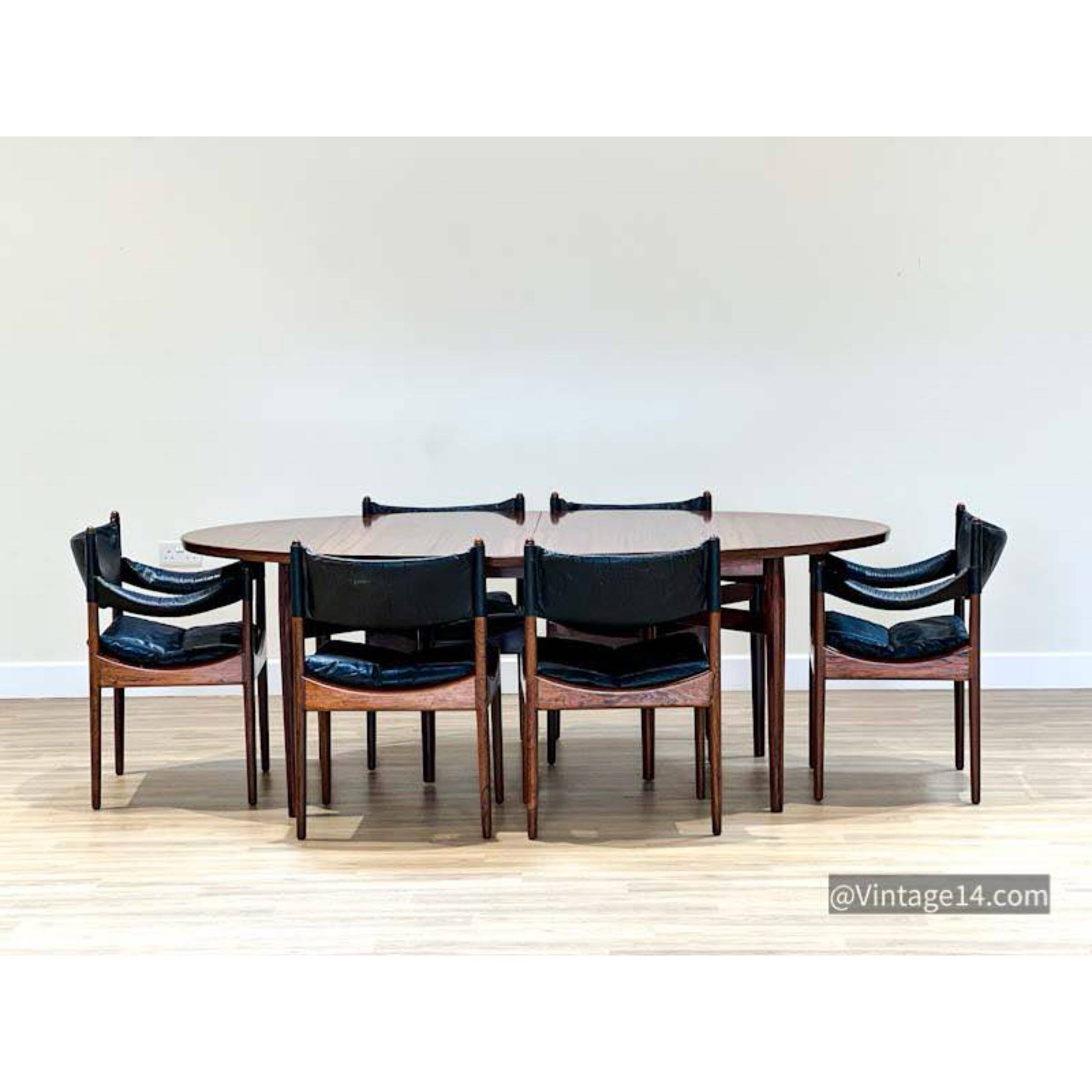 Extendable dining room table and chairs (by Kristian Solmer Vedel)