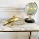 Vintage brass dolphin
