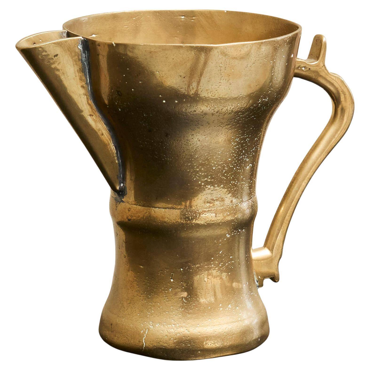 Antique brass jug, 19th century.