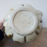 Ceramic pitcher in the shape of a coloquinte melo.