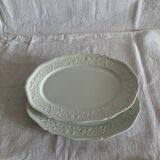 pair of white flowered dishes