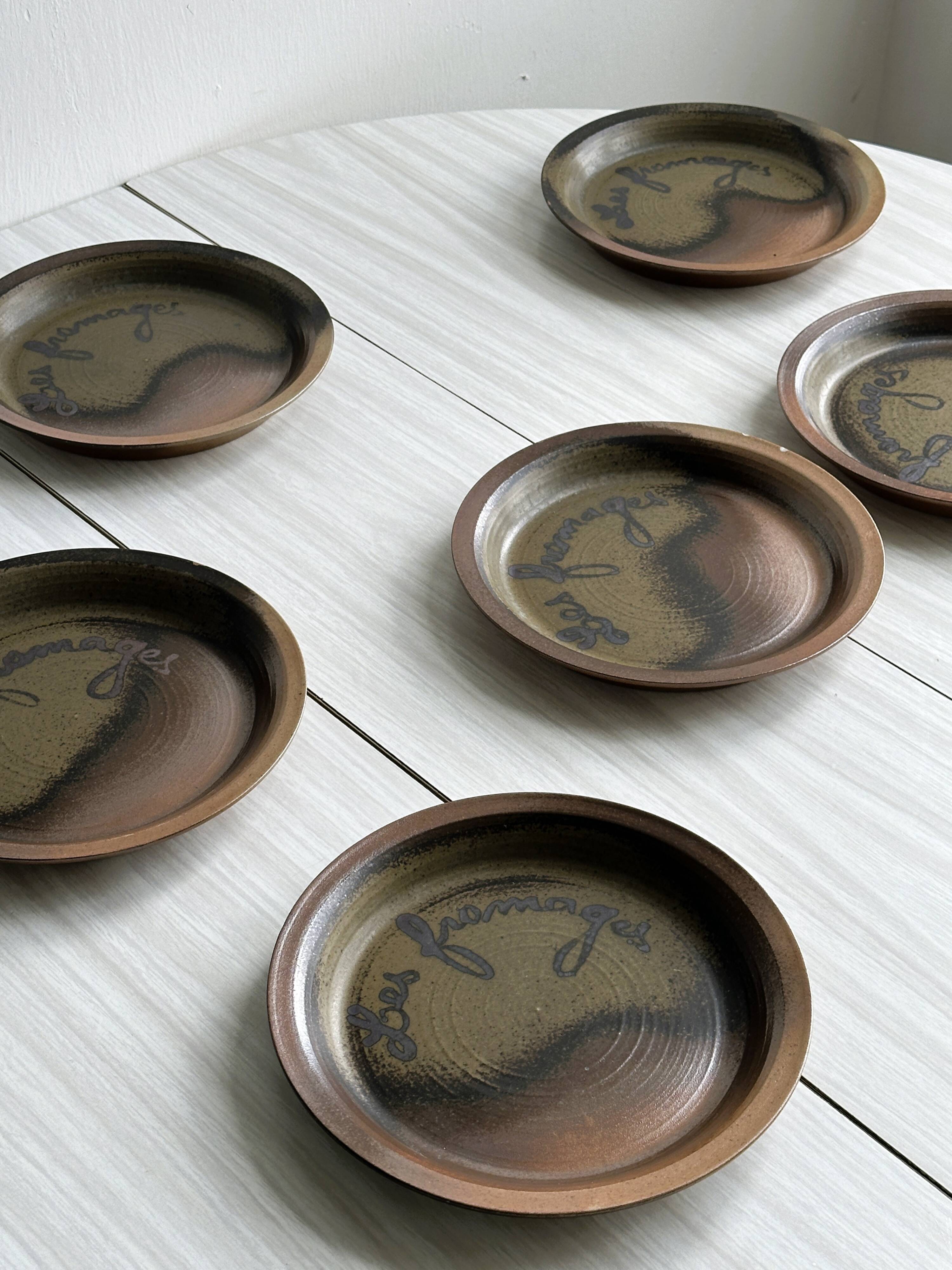 6 Arnon stoneware cheese plates.