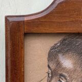 Old painting portrait of black boy in charcoal wooden frame signed RD 96
