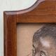 Tableau ancien portrait de garçon noir au fusain cadre en bois signé RD 96