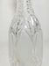Bouteille en verre sculpté