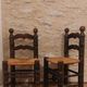 Brutalist chair pair in the style of Dudouyt.