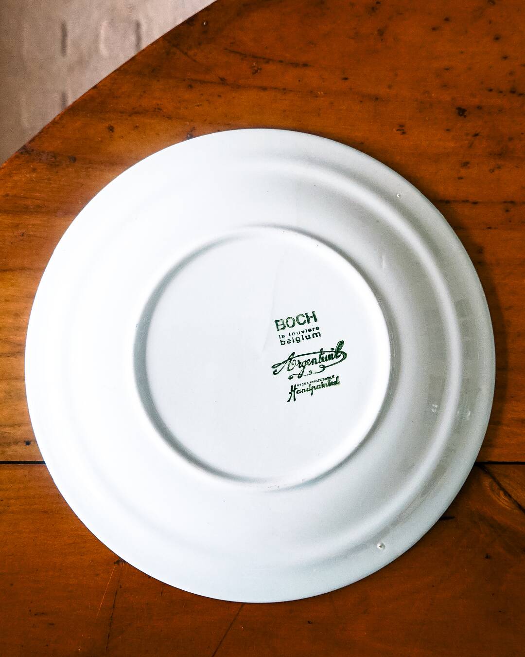 5 plates, mismatched dishes