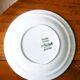 5 plates, mismatched dishes