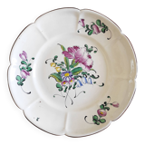 Eastern earthenware plate with flowers