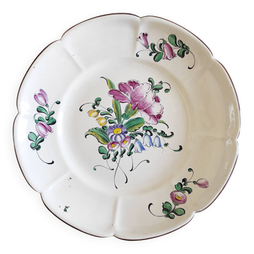 Eastern earthenware plate with flowers