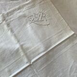 Pair of hand-embroidered SR monogram pillowcases.