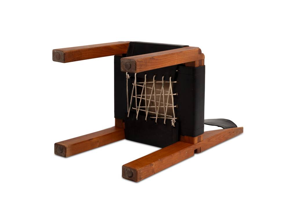 Pierre Chapo. Series of 8 "S11" chairs in elm and leather. 1960s-70s.