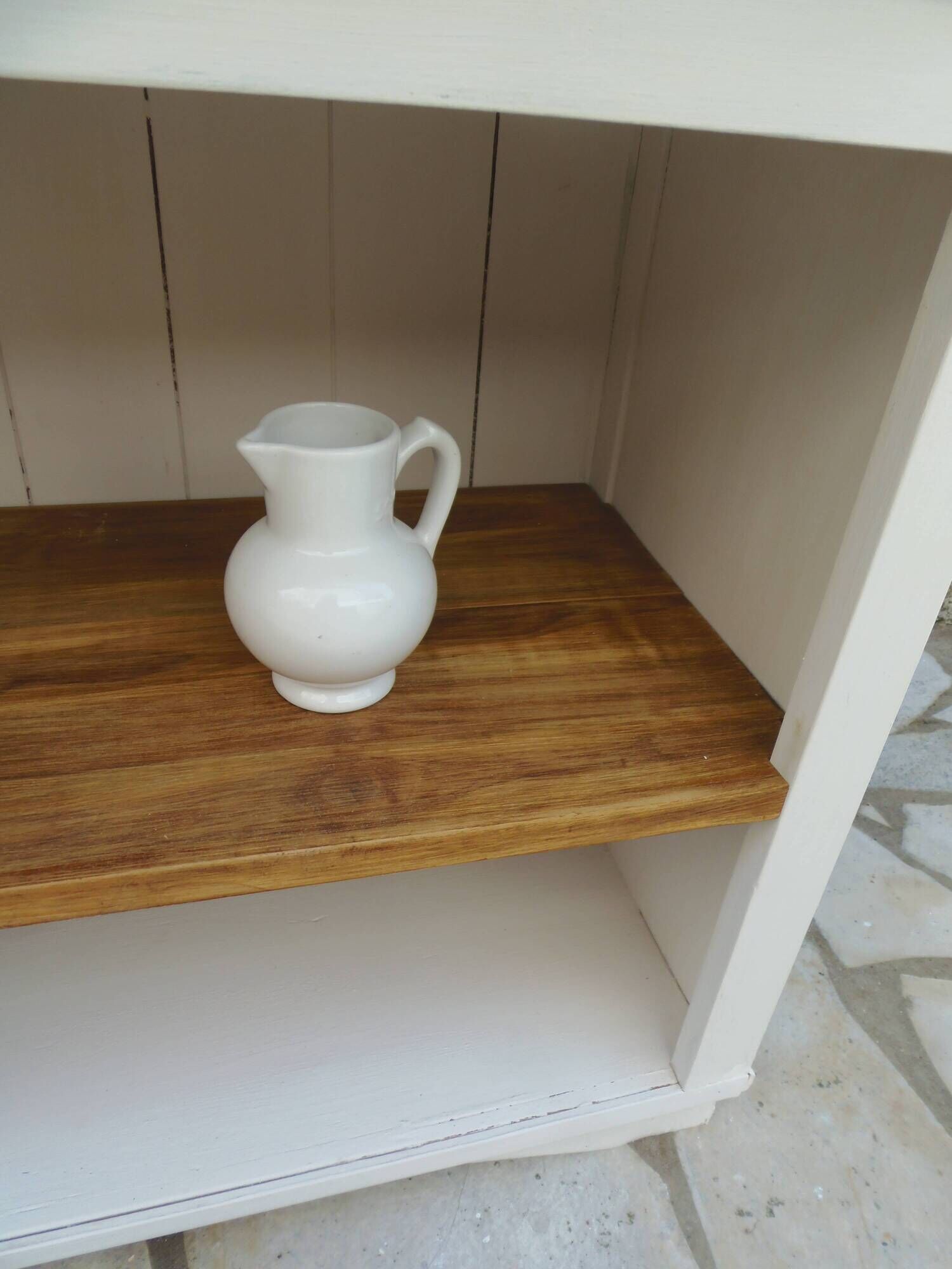 Craft furniture enhanced in pearl gray, shelves and top in raw wood.
