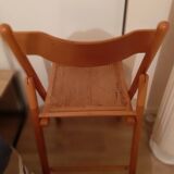 Folding chair in cannage