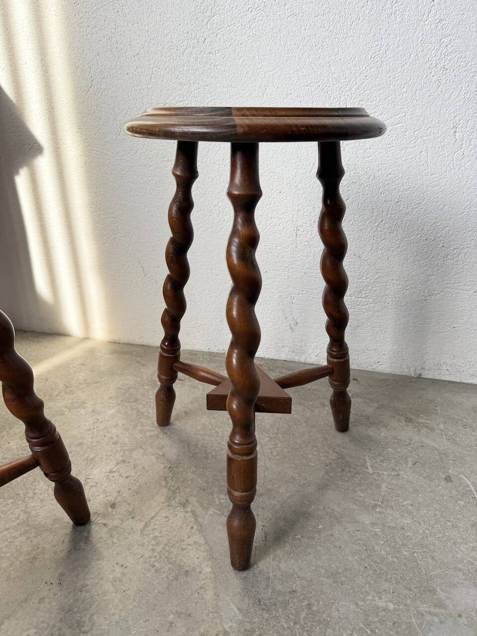 Set of 4 turned oak stools.