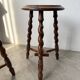 Set of 4 turned oak stools.