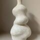 White stoneware vase in an organic shape