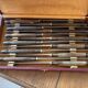 Service of 24 Art Deco knives with wooden handles and engraved metal ferrules from 1930.