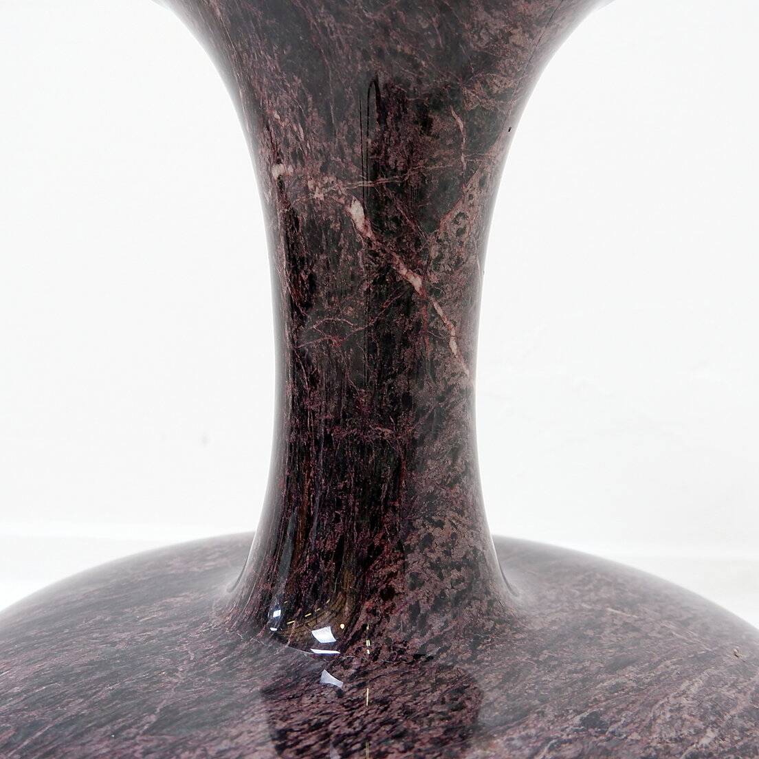 Polished granite vase