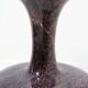 Polished granite vase