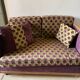 Small 2-seater Art Deco sofa in wood and fabric.