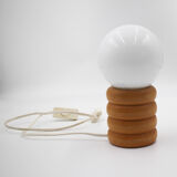 Vintage globe lamp on wooden base