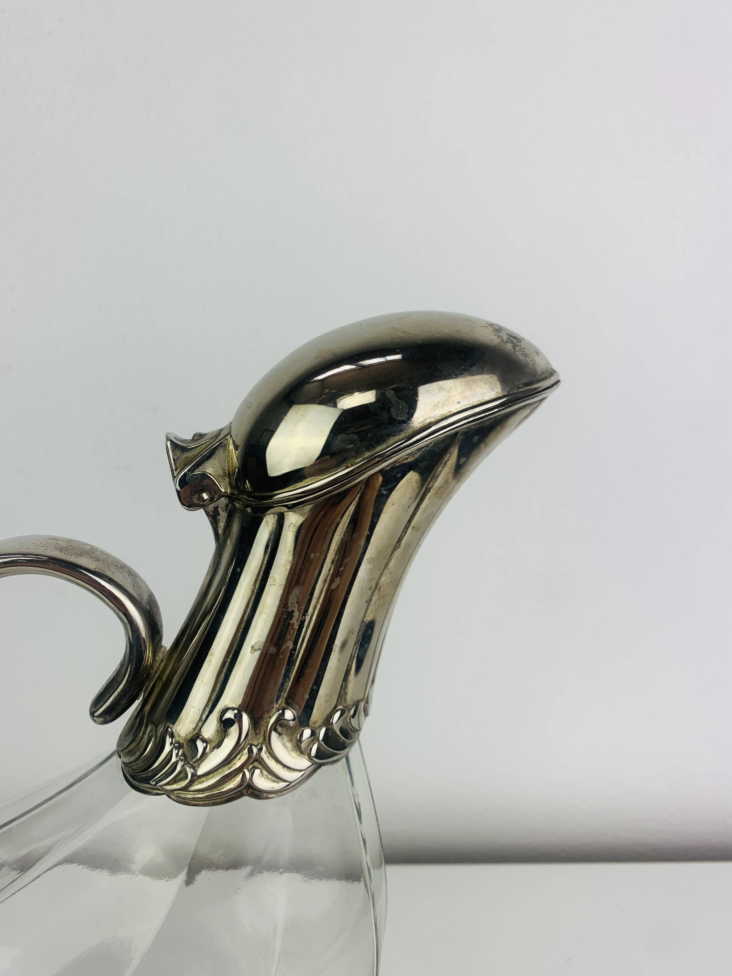 Silver-plated wine carafe jug, duck