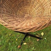 Rattan and iron swivel pod chair, 1960s