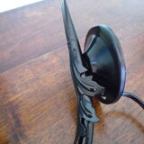 Wall sconces with opalines in the shape of corollas and black metal support