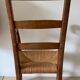 Antique wood and straw armchair