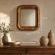 Miroir Louis-Philippe en bois et stuc doré à décor floral, XIXe, 43x38 cm