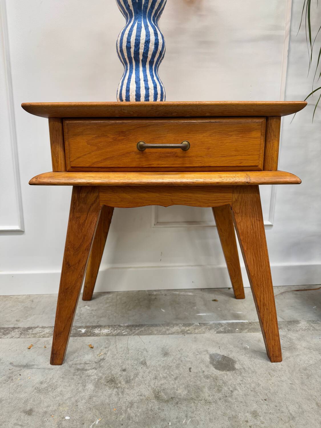 Bedside table with compass feet