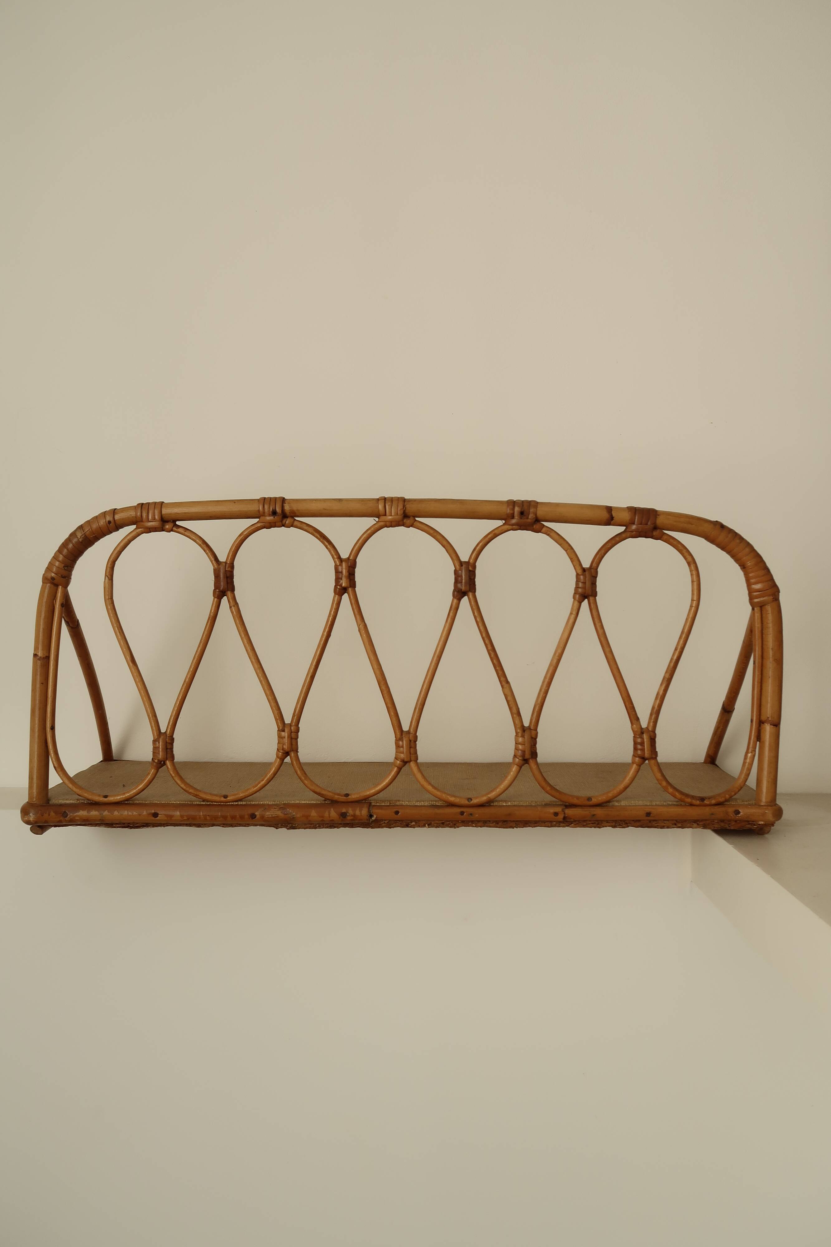 Pair of rattan wall shelves