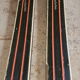 Old skis wooden and its pair of sticks